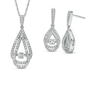 Zales 1/10 CT. T.W. Diamond Pendant and Earrings Set in Sterling Silver.